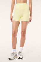 ELSHAM BOUTIQUE soft yellow 5-inch bike shorts with a high-rise V-waistband in peached Studio Soft fabric.