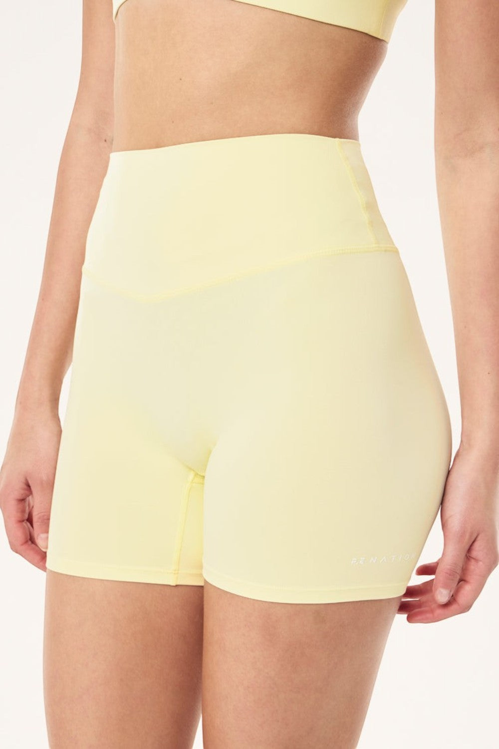 ELSHAM BOUTIQUE soft yellow 5-inch bike shorts with high-rise V-waistband in peached Studio Soft fabric