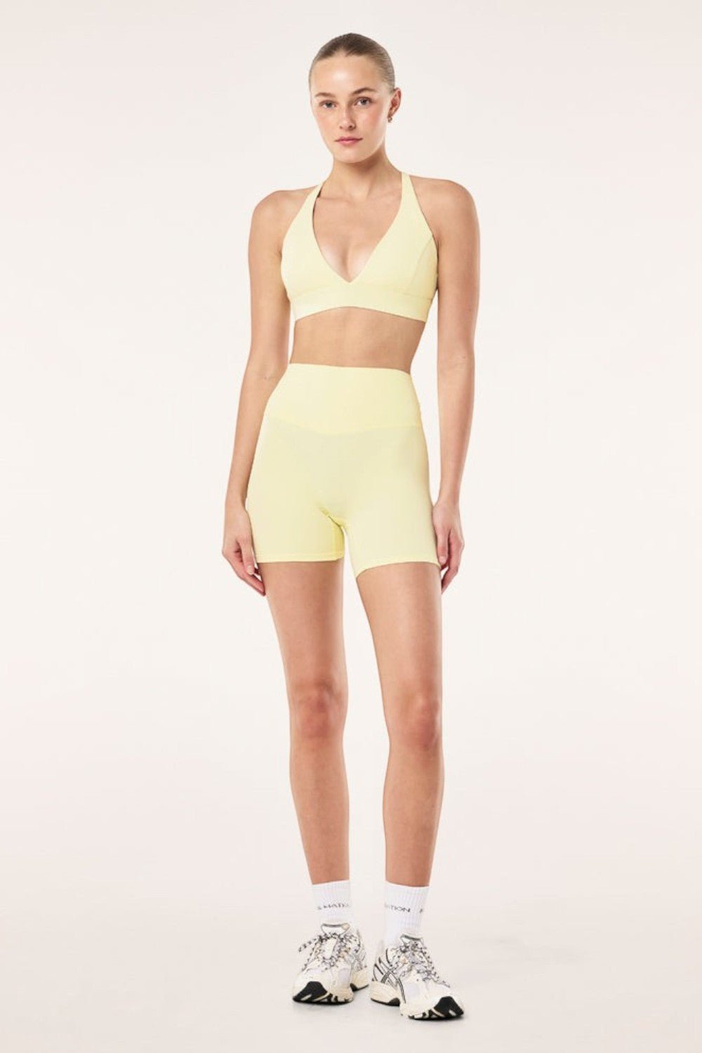 ELSHAM BOUTIQUE soft yellow 5-inch bike shorts with a high-rise V-waistband in peached Studio Soft fabric.
