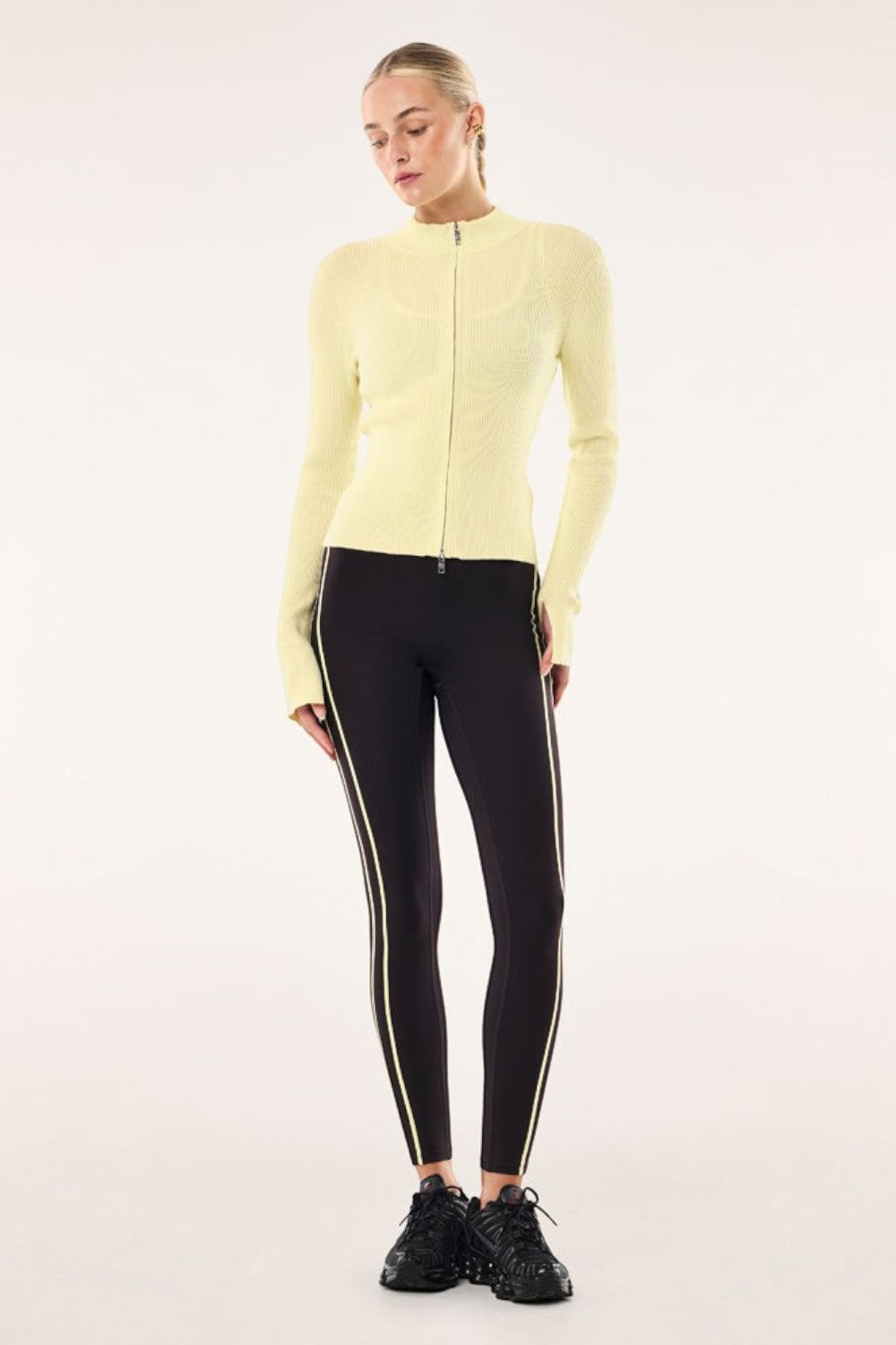 ELSHAM BOUTIQUE soft yellow rib knit zip cardigan with high neck and cuff slits worn with black leggings
