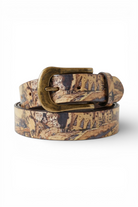 ELSHAM BOUTIQUE printed leather belt with beige studded loop and brass buckle. Features a landscape print.